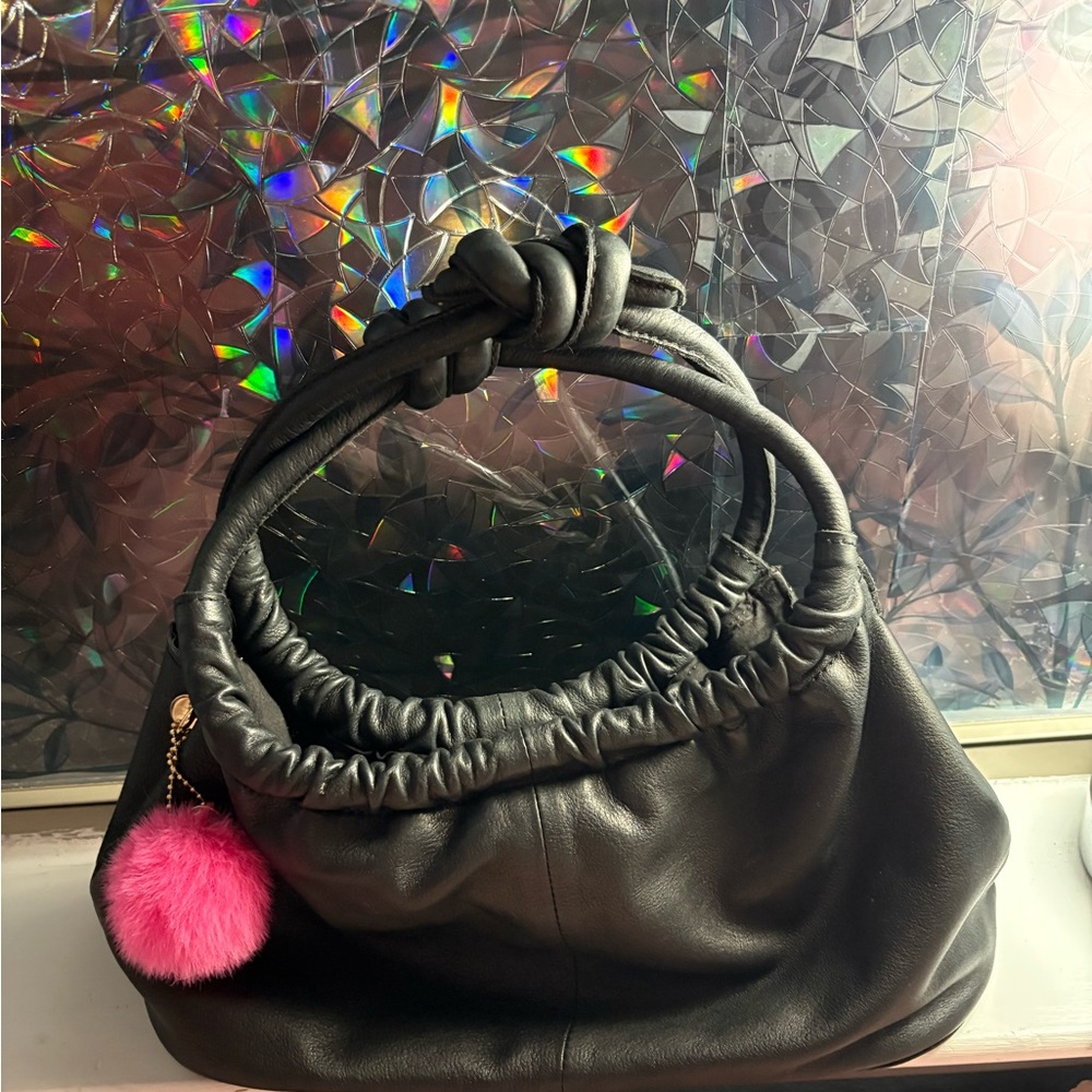 Free People Black Bag with detachable Pink Pom Charm